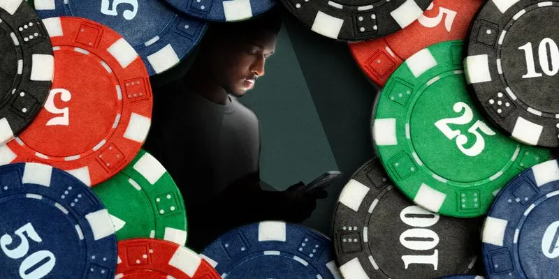 Smiling BD player pointing toward a glowing digital entry portal amid vibrant casino graphics – representing easy TKHOT account recovery